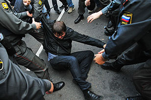 Detained protester. Source: ITAR-TASS