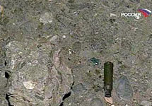 Shell from Alishayev’s crime scene.  Source: Vesti