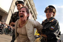 Woman being detained on Moscow's Triumfalnaya Square on May 31, 2010. Source: Getty Images