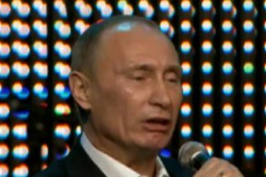 Vladimir Putin singing "Blueberry Hill." Source: Urlesque.com