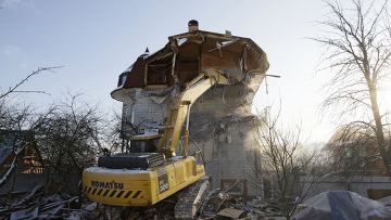 Demolition of a home in Rechnik. Source: RIA Novosti/Anton Denisov